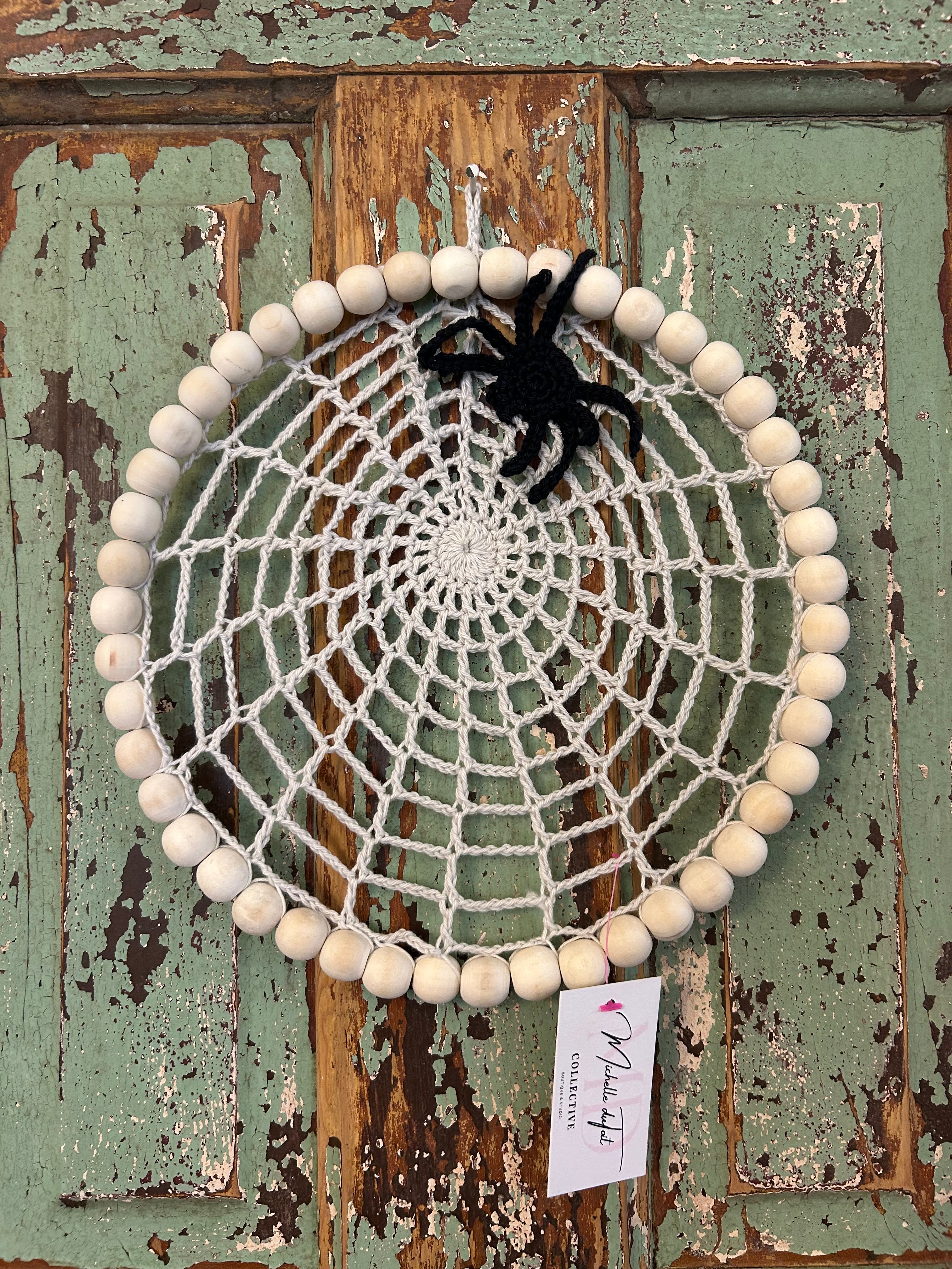 Handmade crocheted spider wall decor