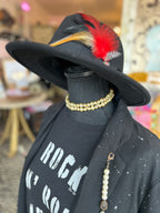 Black fedora hat with assorted feathers