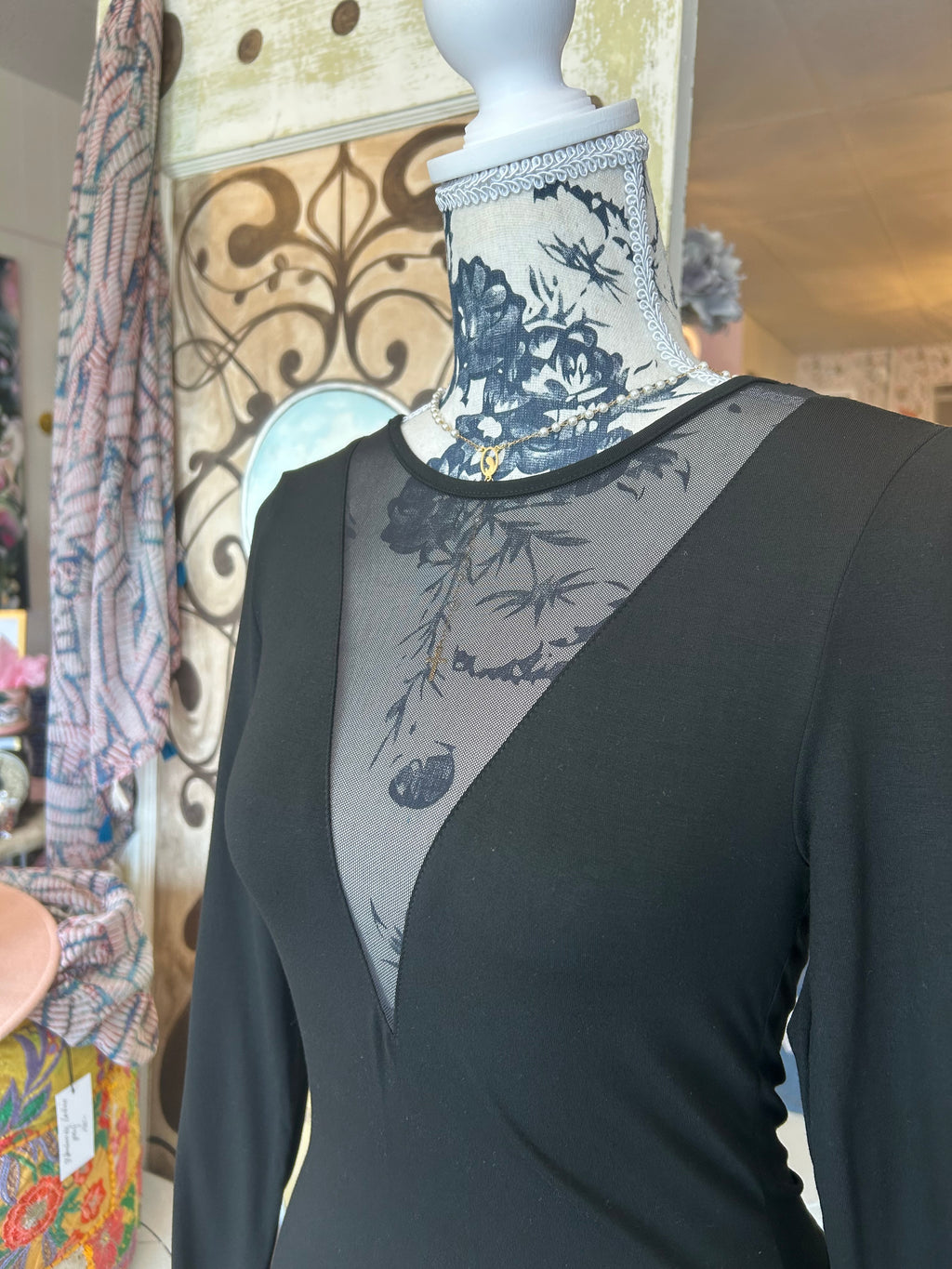 Sheer v-neck black blouse