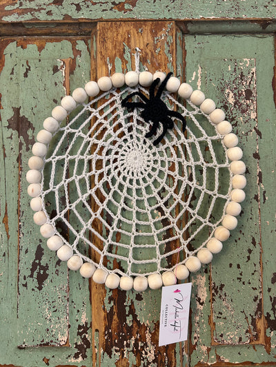 Handmade crocheted spider wall decor