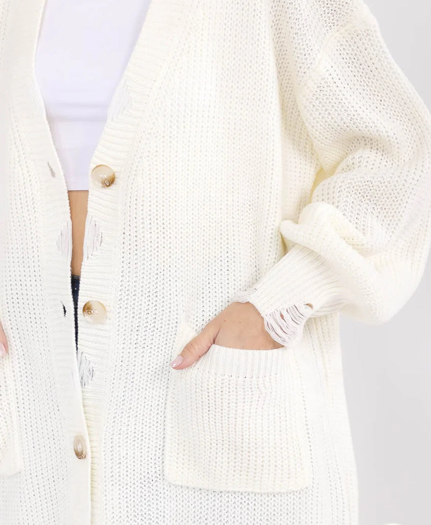 Long frayed knit sweater