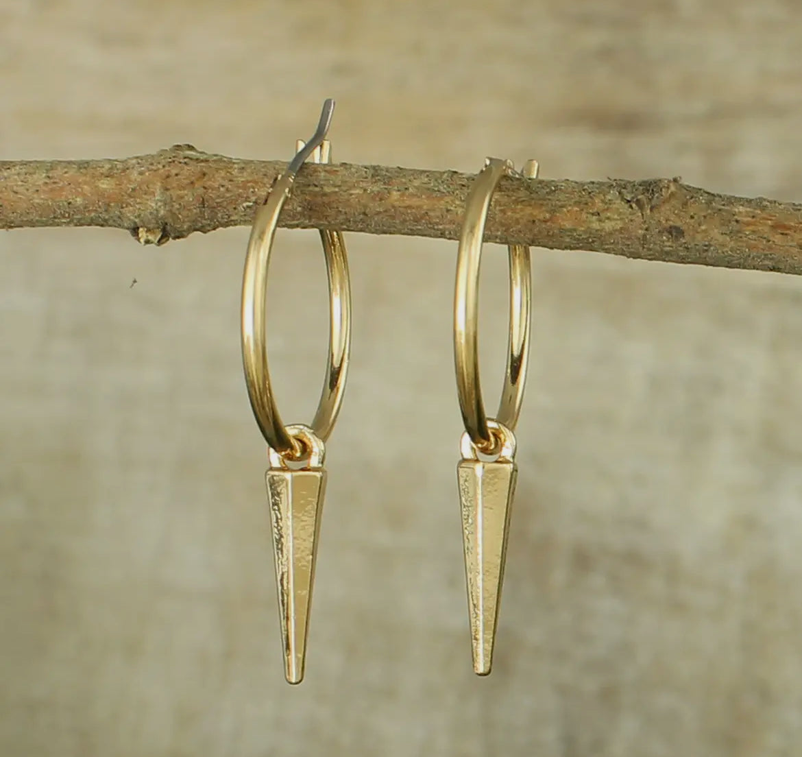 Gold dagger earrings
